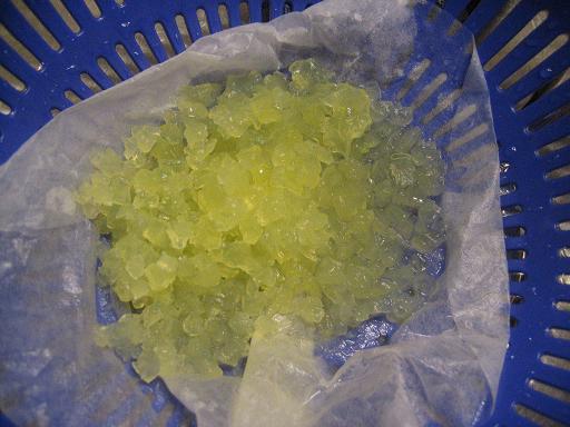 Poor fluorescent yellow kefir grains! I had to take them out of the muslin bag, and I realized how much I LIKE using that bag, especially since my colander has such big holes. I didn't want to lose any down the drain, so I used a coffee filter, but it was a bit tricky to drain.