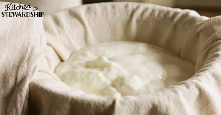 straining yogurt in cloth