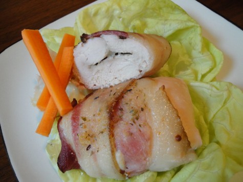 A plate of Puerto Rican Chicken on a butter lettuce leaf