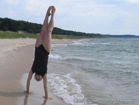 handstand at the beach