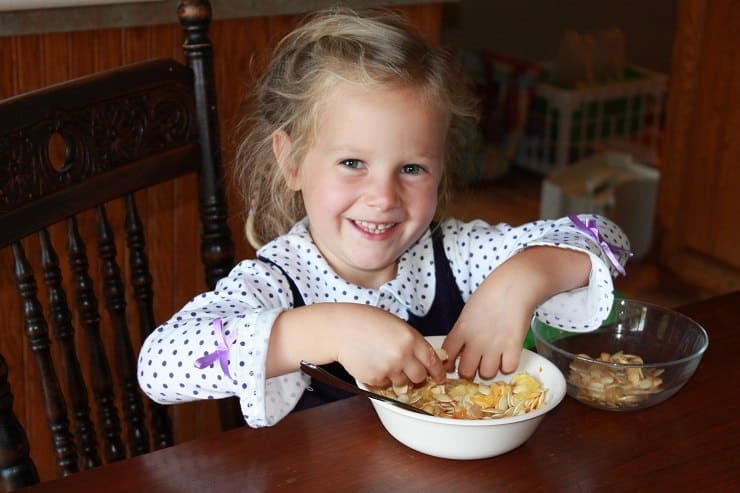 Leah separates pumpkin seeds