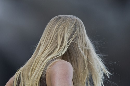 A woman with long blonde hair