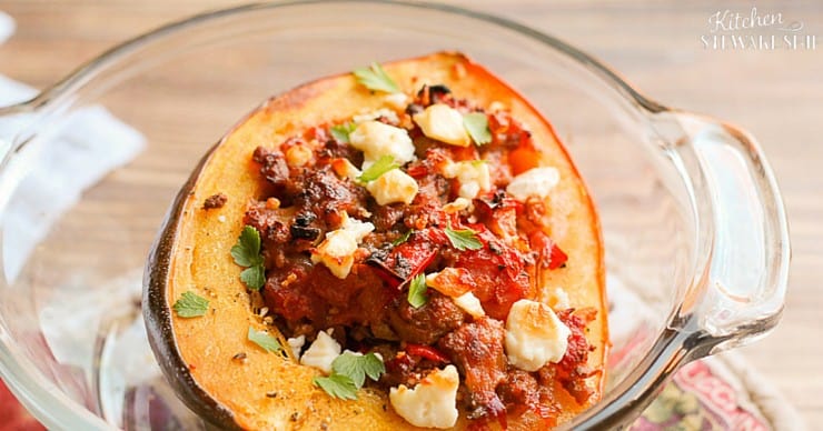 This savory Greek sausage stuffed acorn squash is perfect for a weeknight meal or fancy enough for entertaining guests.