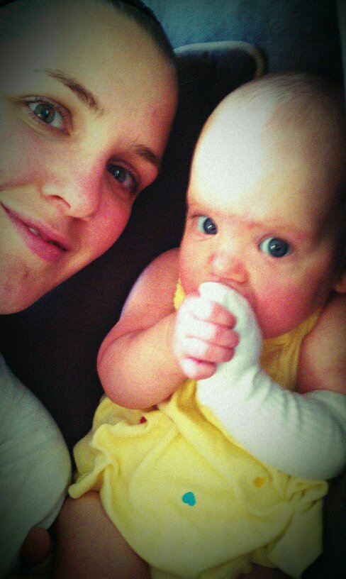 Nikki from Christian Mommy Blogger with her breastfed baby