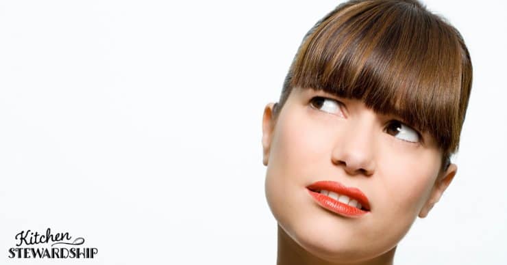 A woman with a bewildered expression