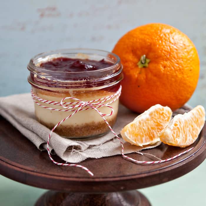 Desserts in jars are such a fun and unique way to serve your family homemade treats. These White Chocolate & Orange Cheesecakes with Cranberry Sauce are amazing and are pretty enough for company as well.