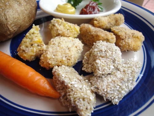 Gluten-free breaded chicken nuggets on a plate