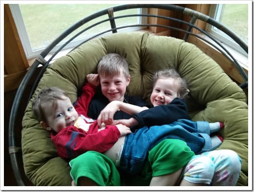 kids in the chair at Andrew and Jeffs house