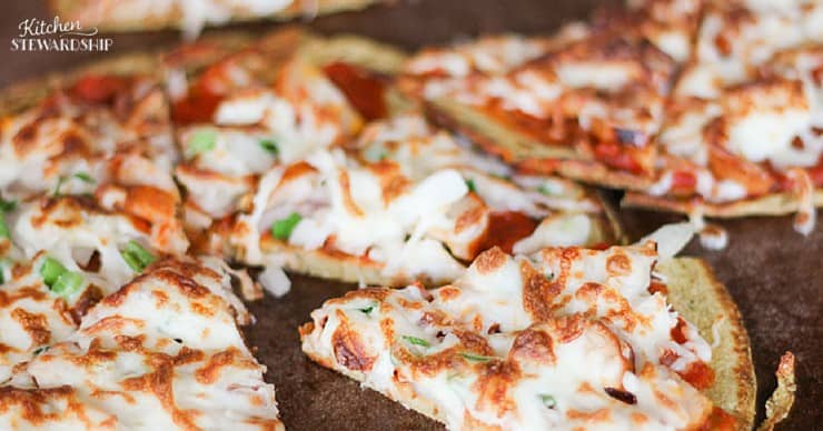 Homemade pizza on a gluten-free chickpea pizza crust.