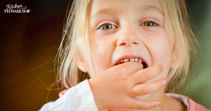 picky eater girl at a table