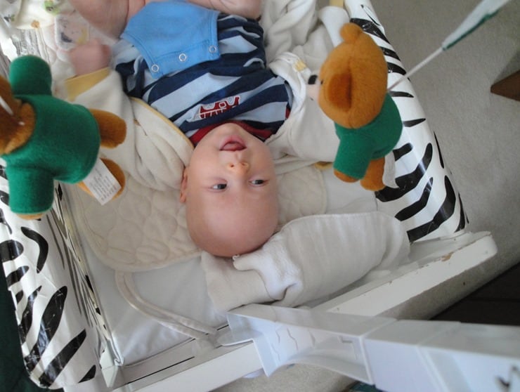 Happy baby during newborn cloth diaper change