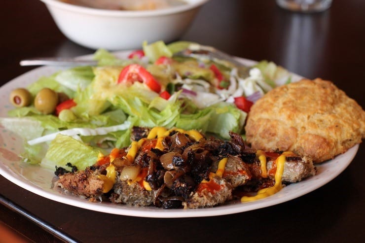 Grassfed Liver big salad with Caesar dressing and olives grain free biscuit and Cheeseburger Sou