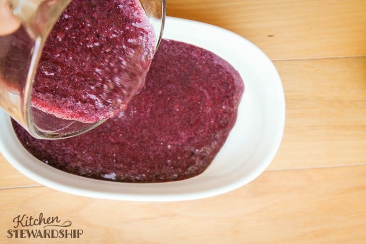 Pouring blueberry gummies