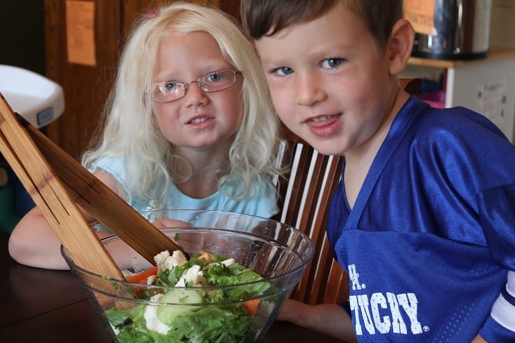 Making a salad with colorful veggies