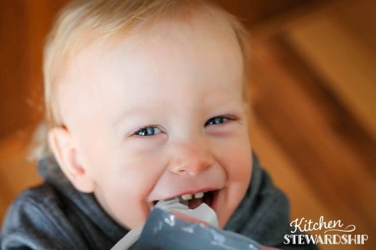 Squooshi full of grain free pumpkin pie breakfast porridge perfect for a messy baby and a happ