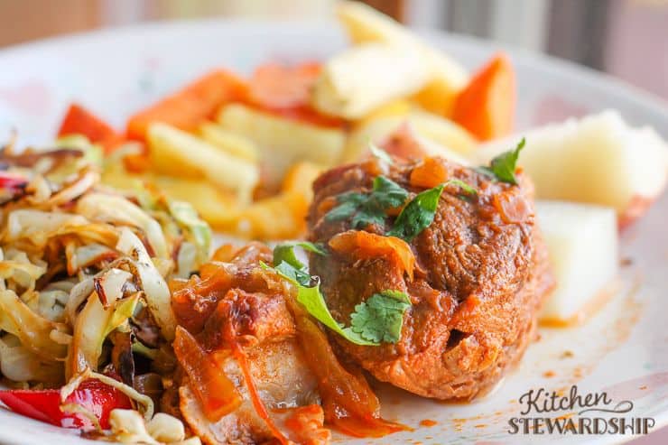 Whole 30 BBQ Pork Boneless Ribs with roasted root veggies boiled reds and sauteed cabbage mushrooms and peppers