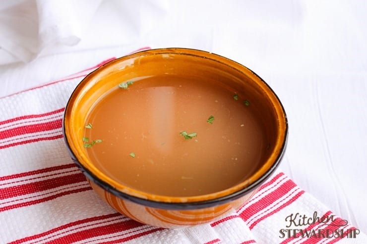 Bowl of chicken bone broth nourishing and delicious