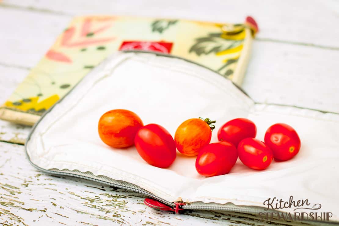 cherry tomatoes on flat reusable snack bag from 2 Red Hens