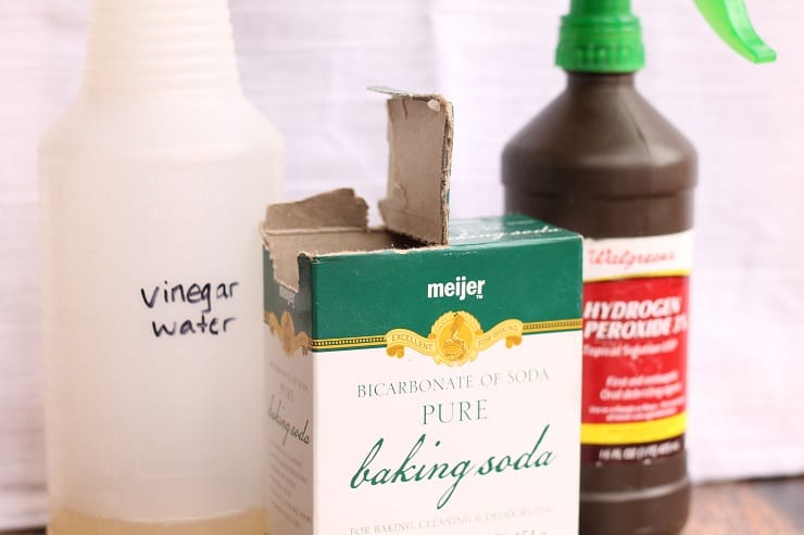 3 Non Toxic Cleaners Under my Sink Vinegar Water Baking Soda and Hydrogen Peroxide Water