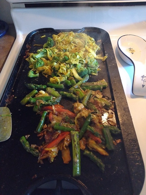 re heating leftover veggies and zoodles on the griddle