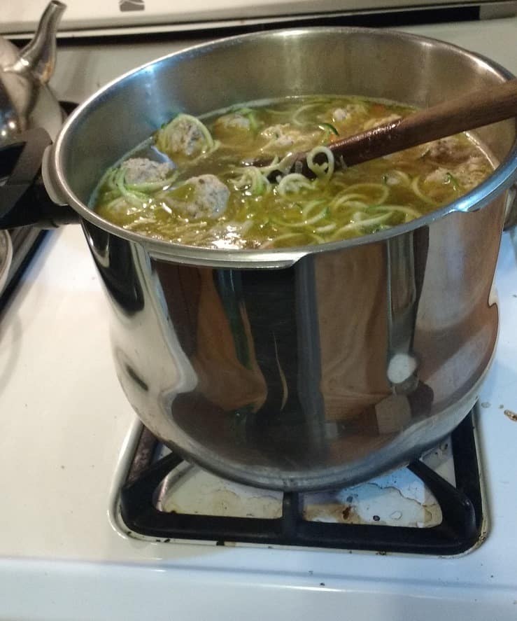 zoodles in huge pot of meatball soup