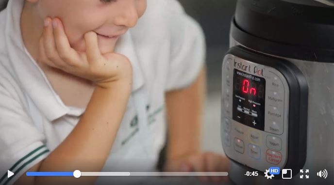 Kid looking at Instant Pot