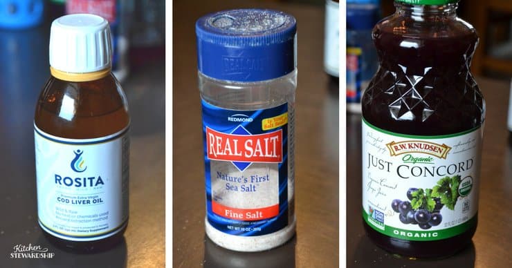 Bottle of Rosita cod liver oil, Redmond Real Salt and organic grape juice.