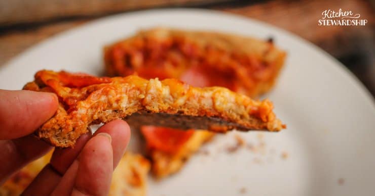 Showing the crispy crust of the whole grain einkorn pizza dough.
