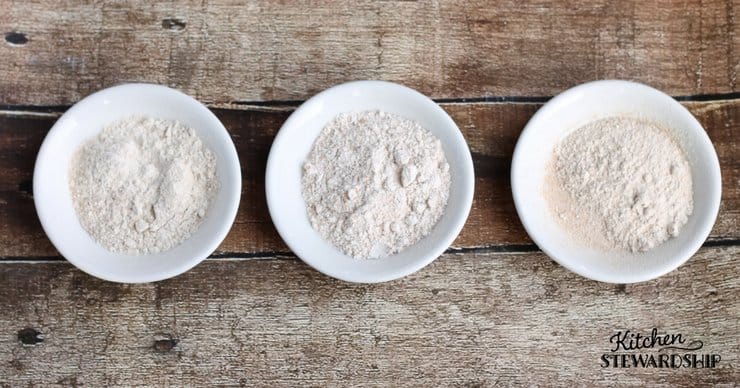 3 dishes filled with freshly milled flours.