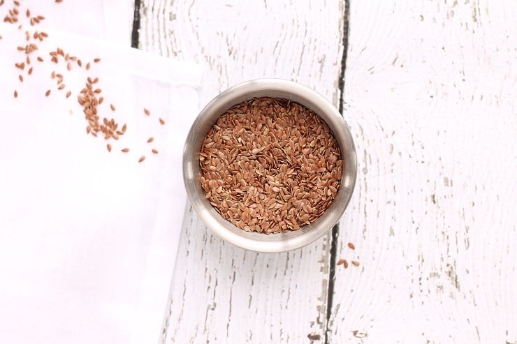 A bowl of unground flax seeds.