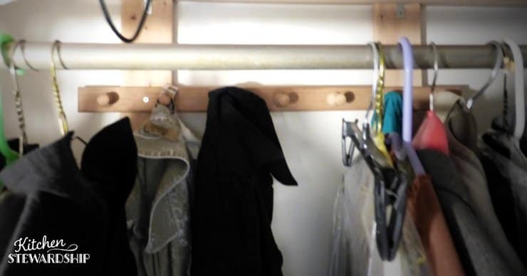 Increase closet space with hooks behind the rod.