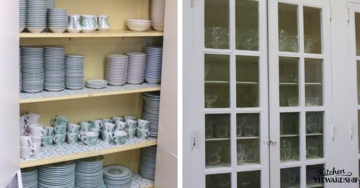 cabinet of glass dishes, mugs and plates. 