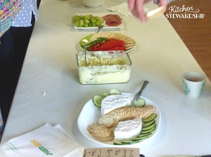 church potluck; hummus, cheese, crackers, vegetables