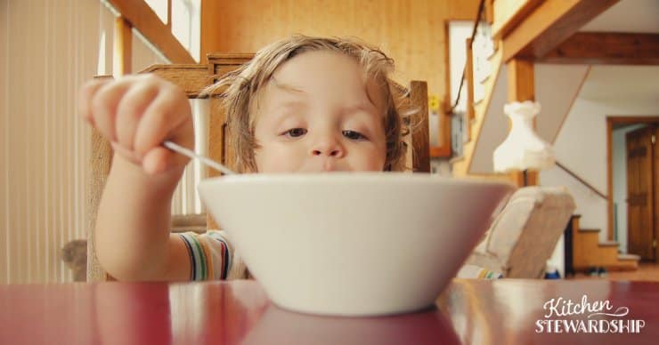 child eating a bowl of cereal