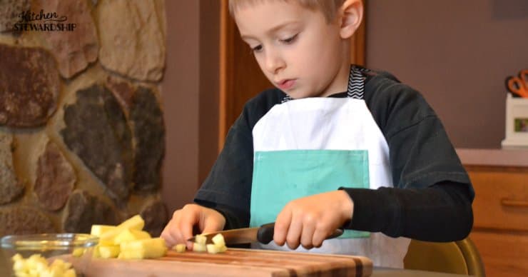 boy cutting with a sharp knife