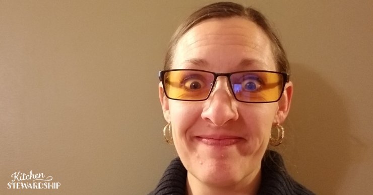 Katie Kimball wearing blue blocker glasses to improve her sleep.