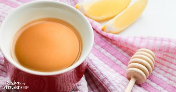 cup of tea with honey and lemon to improve sleep