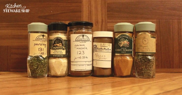 Bulk herbs and spices stored in reused glass jars
