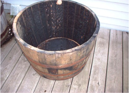 Empty half barrel for gardening