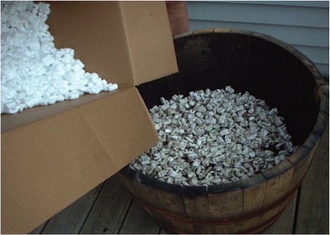 Half barrel being prepared for planting