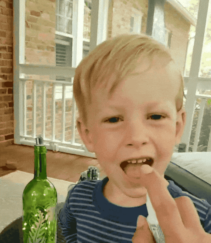 child using beekeepers naturals propolis throat spray