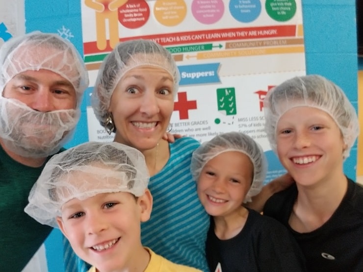 family volunteering at Kids Food Basket, birthday celebration ideas