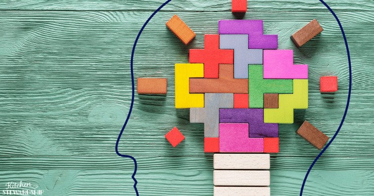 brain with puzzle pieces inside