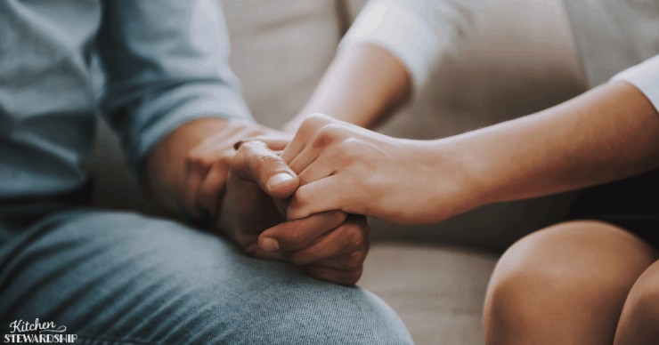 two people holding hands