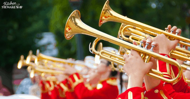 horns and men in red uniforms