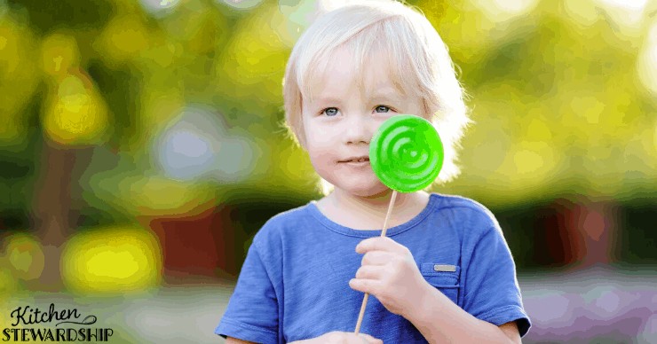 child with lollipop
