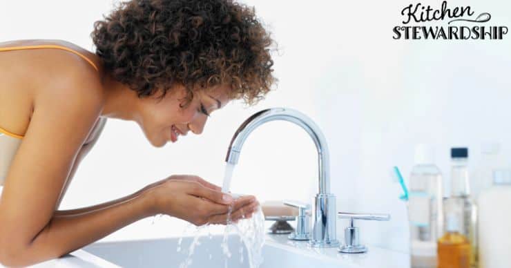 woman washing face