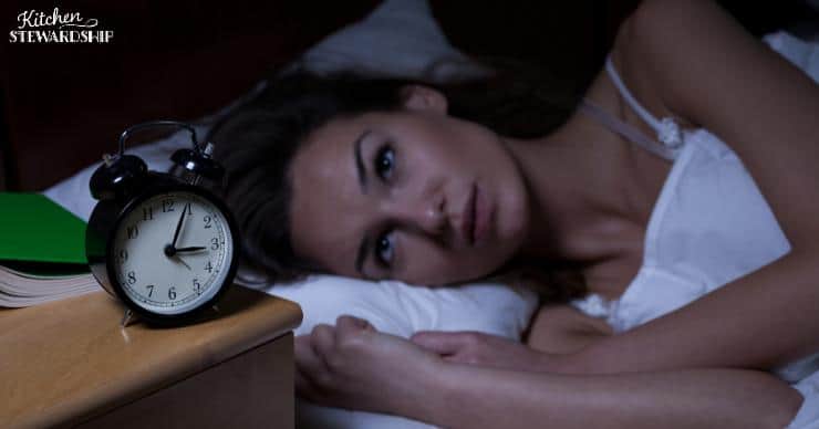 Woman with insomnia awake at 3am
