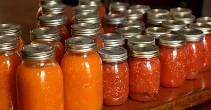 canned tomatoes in mason jars