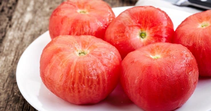peeled tomatoes on plate